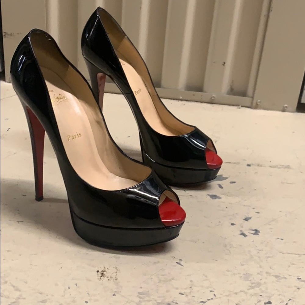 Louboutin pumps with red peep toe detail
